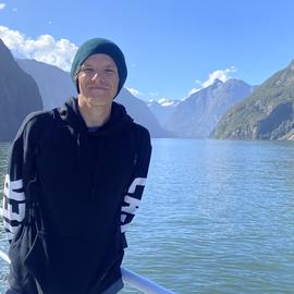 Erik in front of some mountains