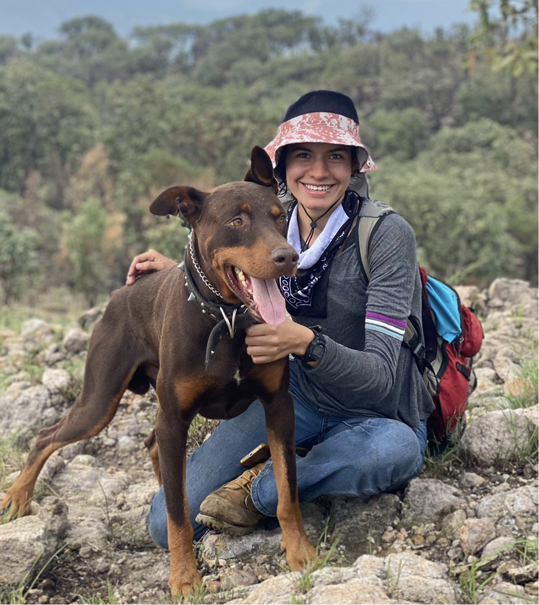 Lucia on a hike with her dog (Duke)